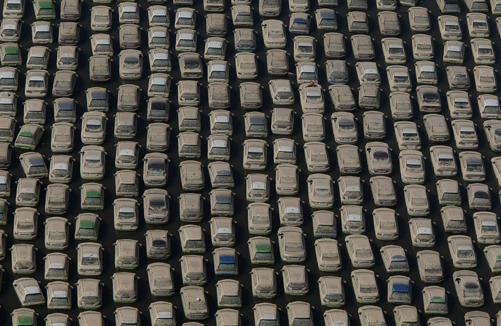 Утилизация автомобилей компанией Honda после наводнения в Таиланде