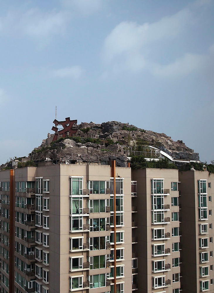 Незаконное строительство по-китайски: горная вилла на 26 этаже