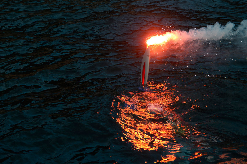 Также, на озере Байкал Олимпийский факел погружался под воду,