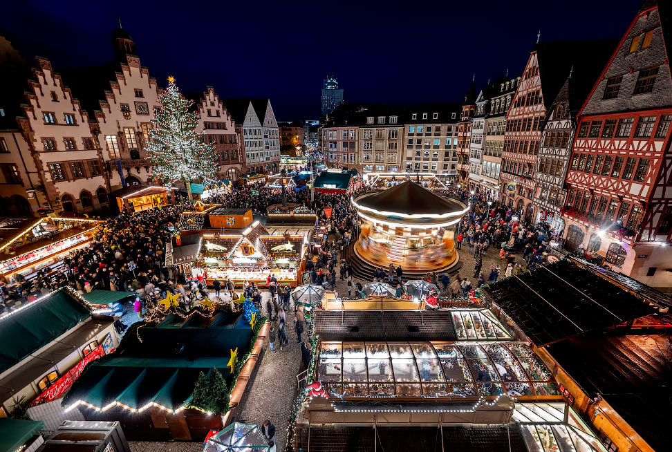 Lights illuminate the traditional Christmas Market that was opened in Frankfurt, Germany, Monday, Nov. 21, 2022. (AP Photo/Michael Probst)